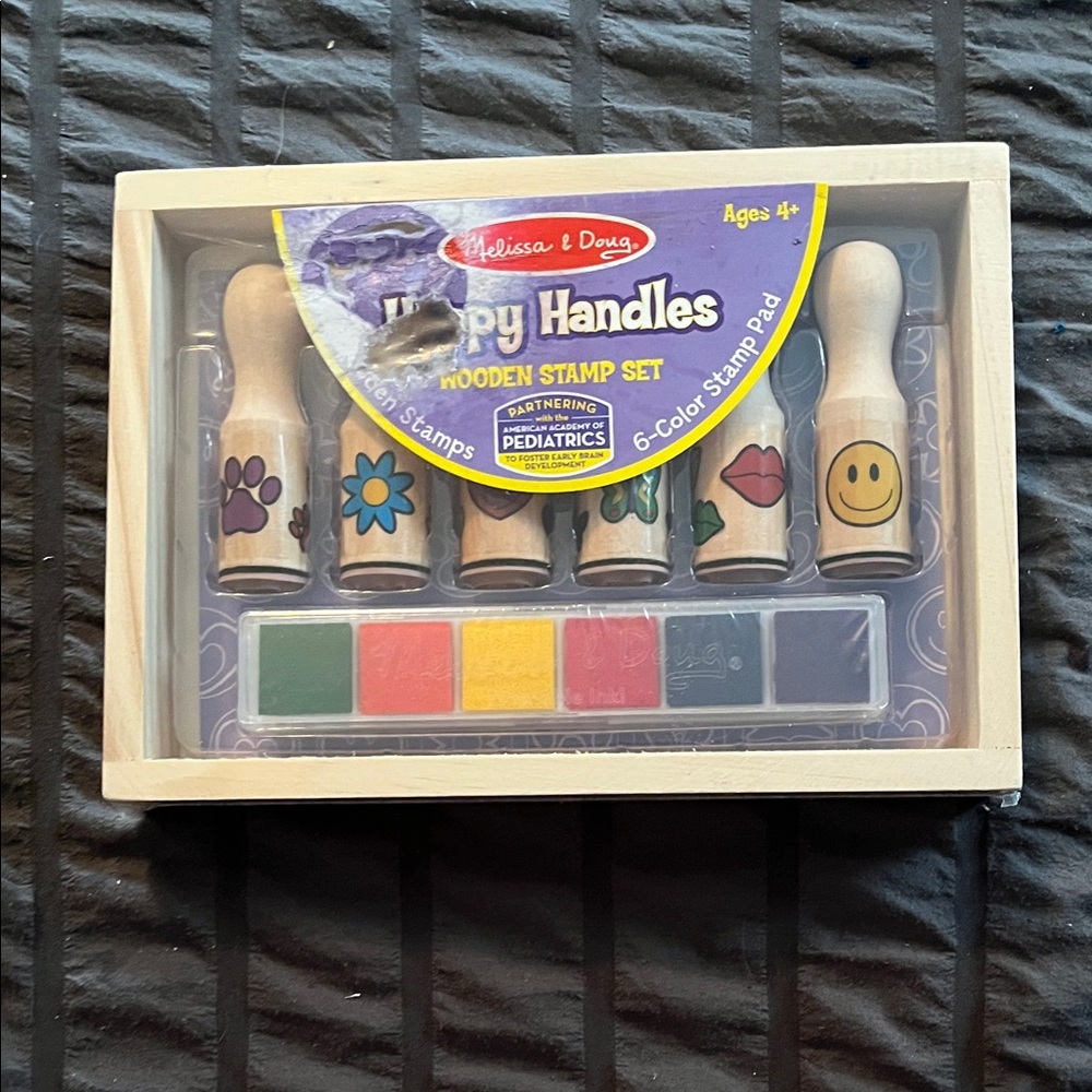 Melissa & Doug Happy Handles Wooden Stamp Set - Red, Blue, Green, Yellow